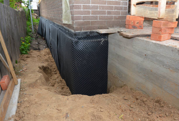 Happy homeowners after waterproofing job in Graysville